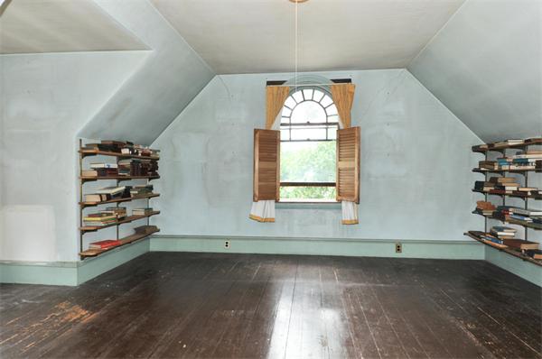 19 Marion Road Watertown, MA 02472 - Photo 7 of 20 an empty room with wooden floor and windows