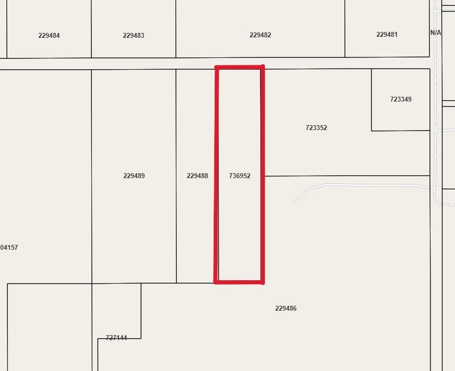 16965 Cowan Road Alvin, TX 77511 - Photo 2 of 2 a white refrigerator freezer sitting next to a white cabinet