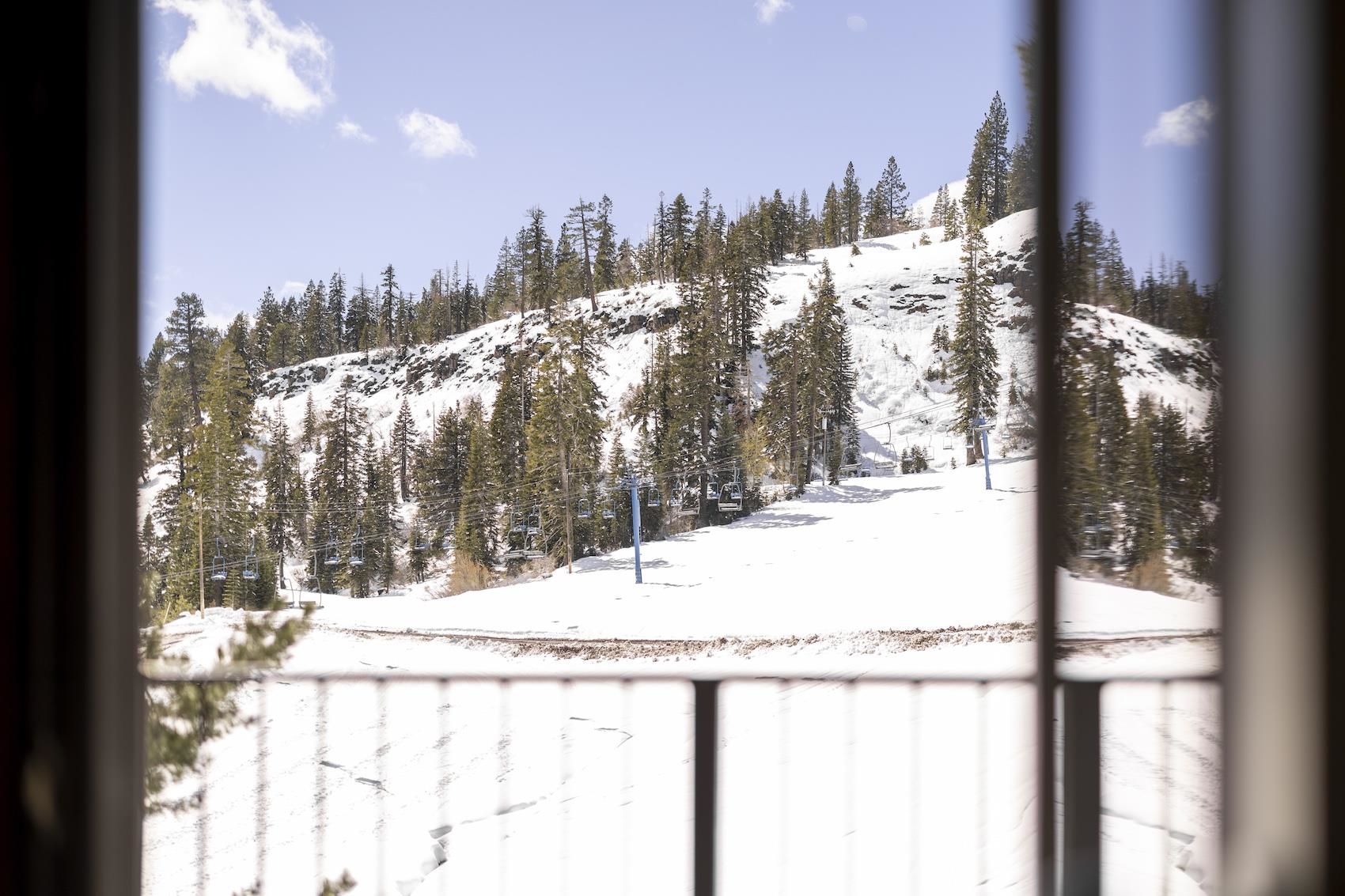 10150 Ski Ranch Lane, Unit 309 Soda Springs, CA 95728 - Photo 18 of 19 a view of a snow covered with the trees