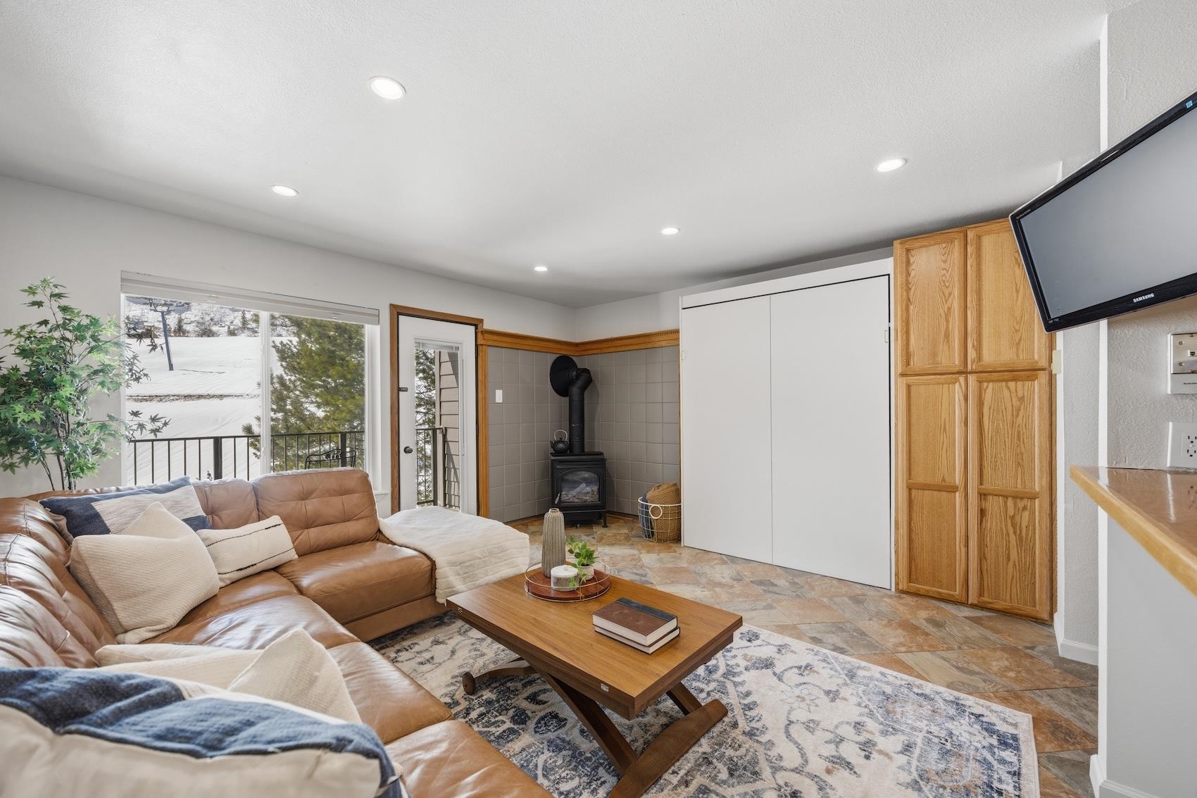 10150 Ski Ranch Lane, Unit 309 Soda Springs, CA 95728 - Photo 3 of 19 a living room with furniture and a window