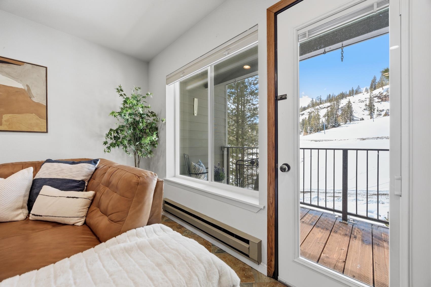 10150 Ski Ranch Lane, Unit 309 Soda Springs, CA 95728 - Photo 5 of 19 a view of a room with furniture and a window