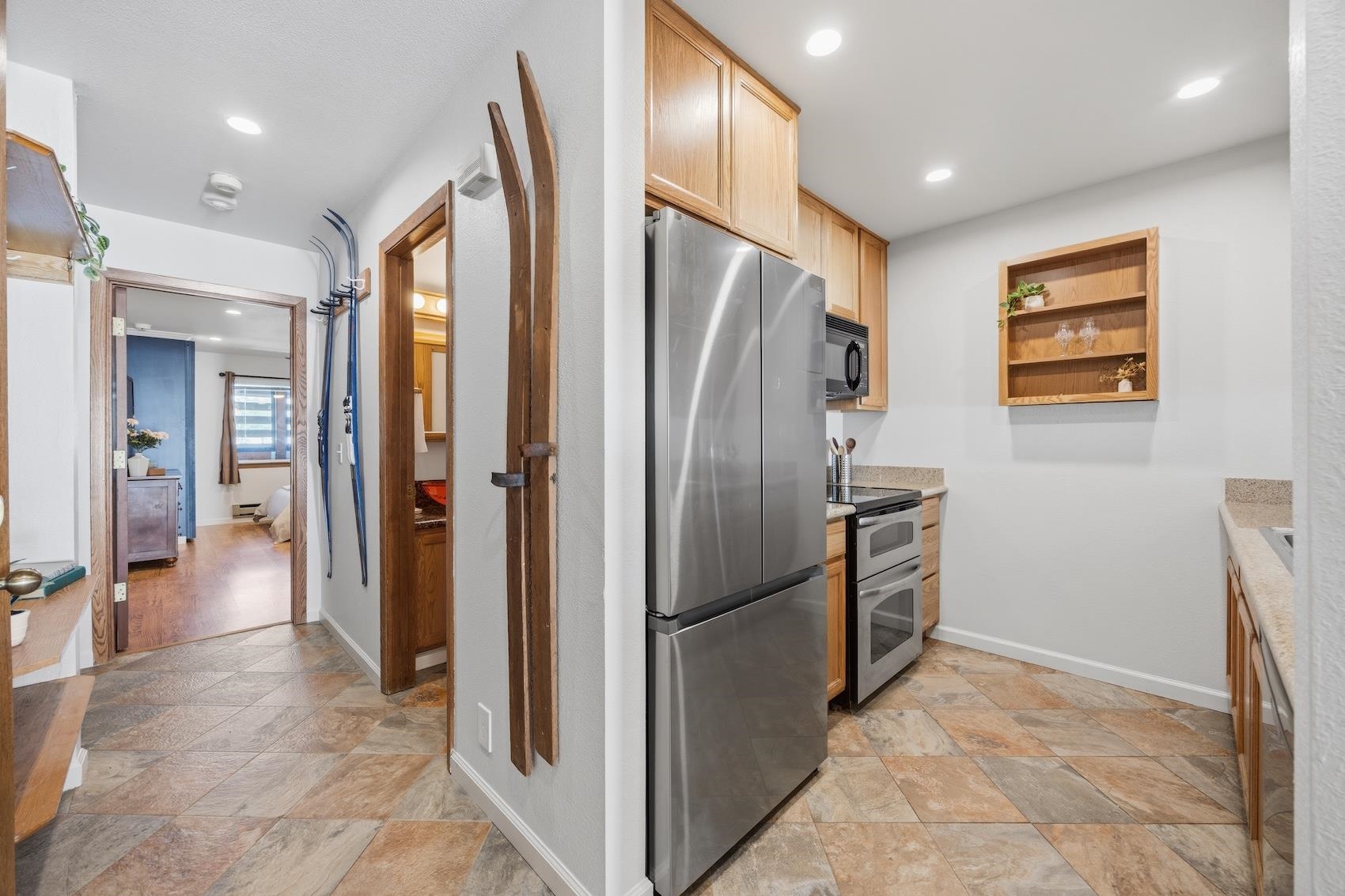 10150 Ski Ranch Lane, Unit 309 Soda Springs, CA 95728 - Photo 9 of 19 a view of a refrigerator in kitchen and an empty room