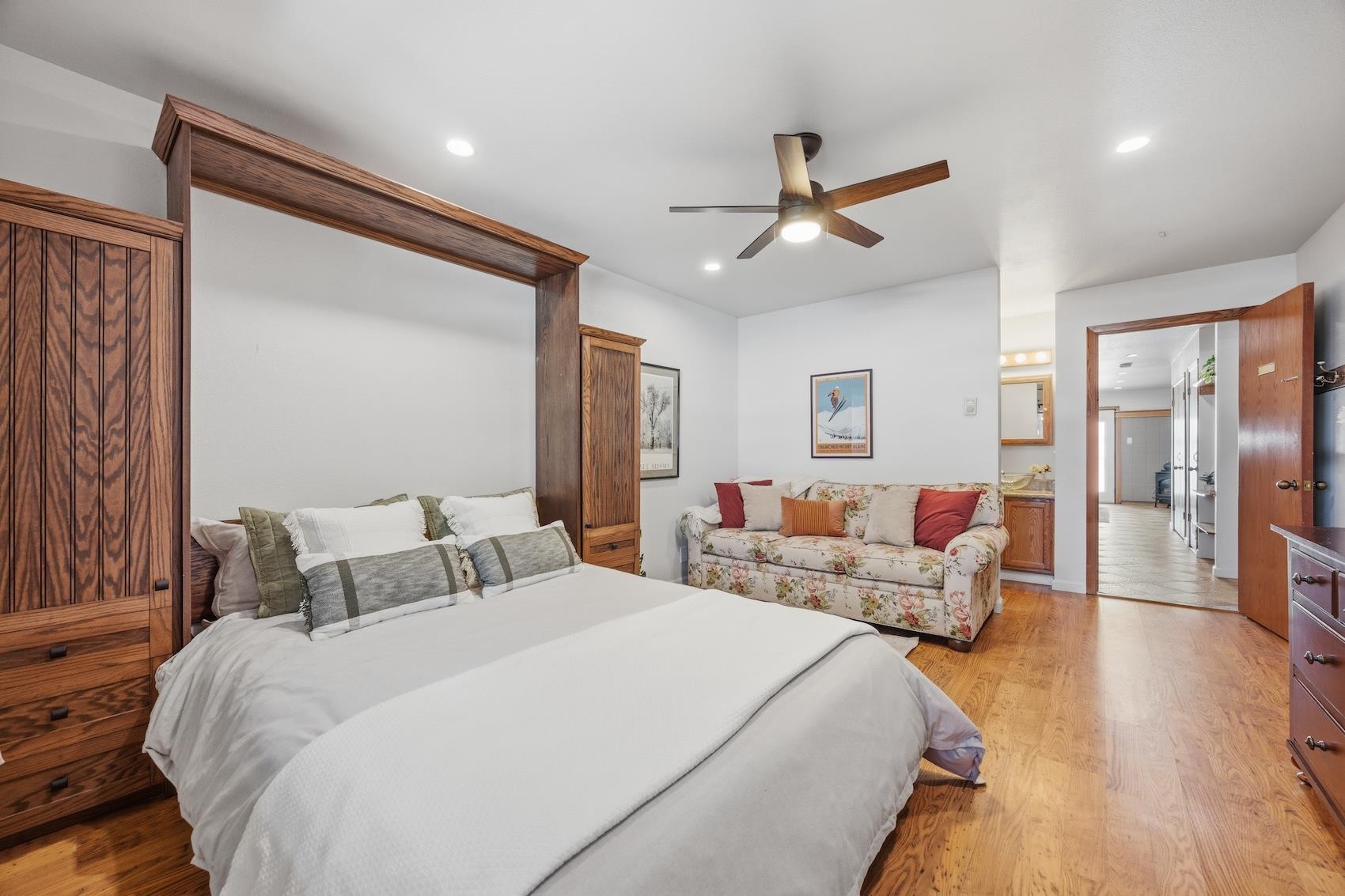 10150 Ski Ranch Lane, Unit 309 Soda Springs, CA 95728 - Photo 10 of 19 a bedroom with a large bed and a chandelier