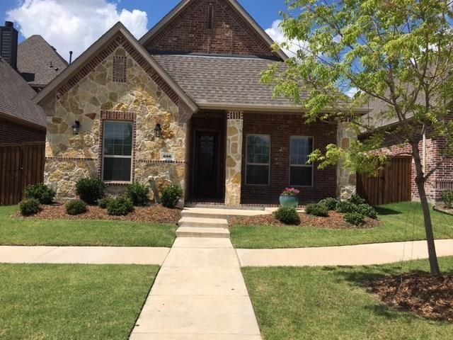 686 Pendle Forest Drive Frisco, TX 75036 - Photo 1 of 22 a front view of a house with garden