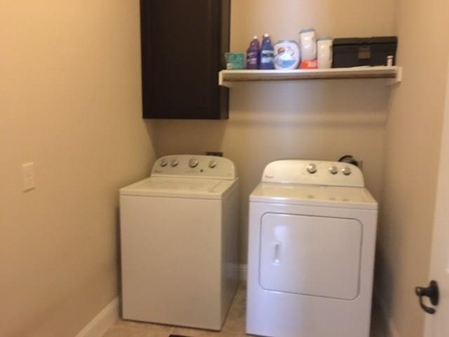 686 Pendle Forest Drive Frisco, TX 75036 - Photo 20 of 22 a utility room with dryer and washer