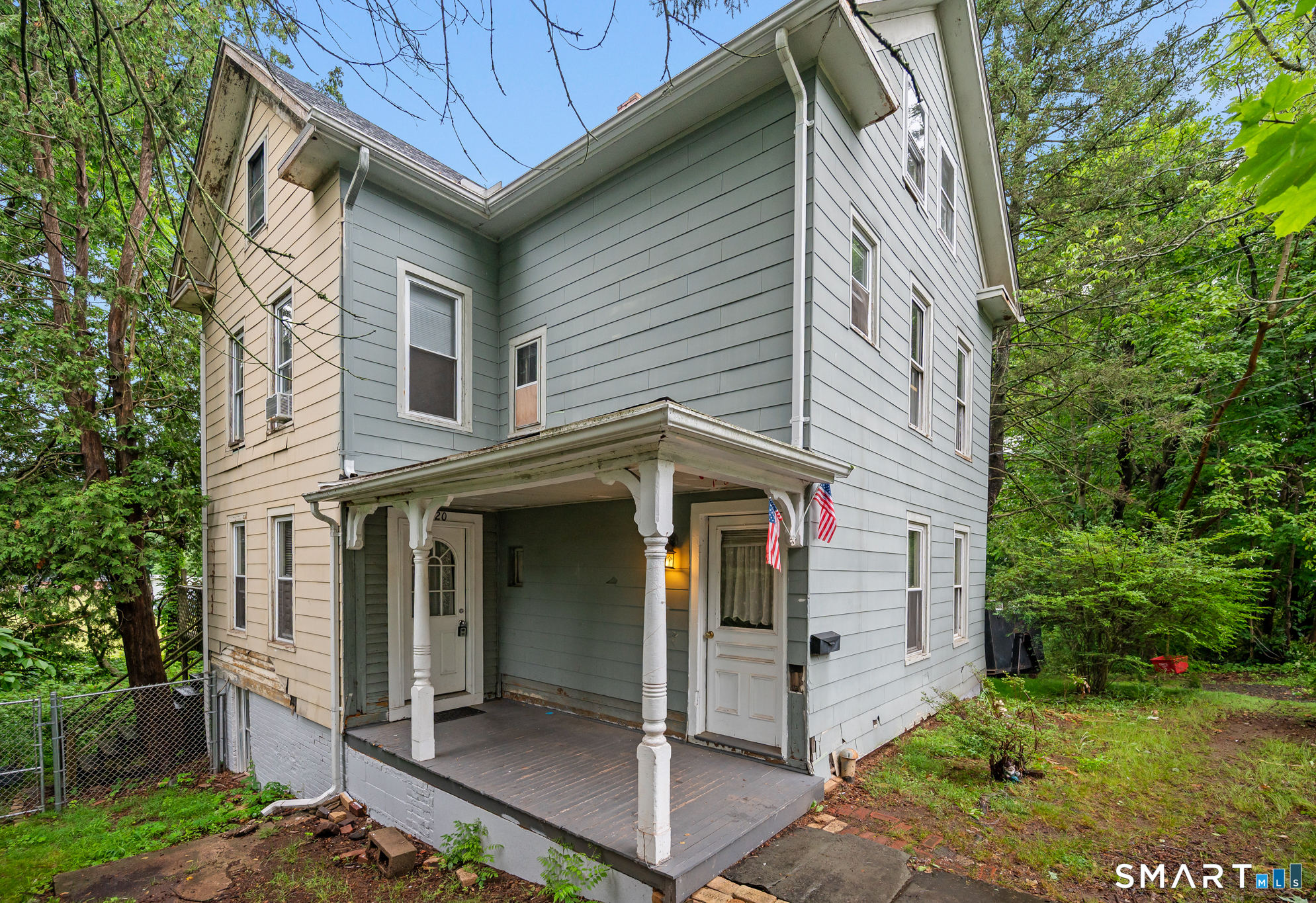 220 Murray Street Meriden, CT 06450 - Photo 1 of 28 a view of a white house with a small yard and plants