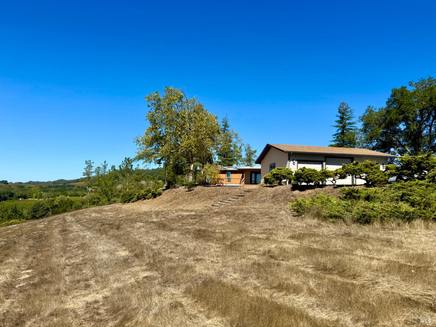 1676 Chiquita Road Healdsburg, CA 95448 - Photo 33 of 45 a view of a house with a yard