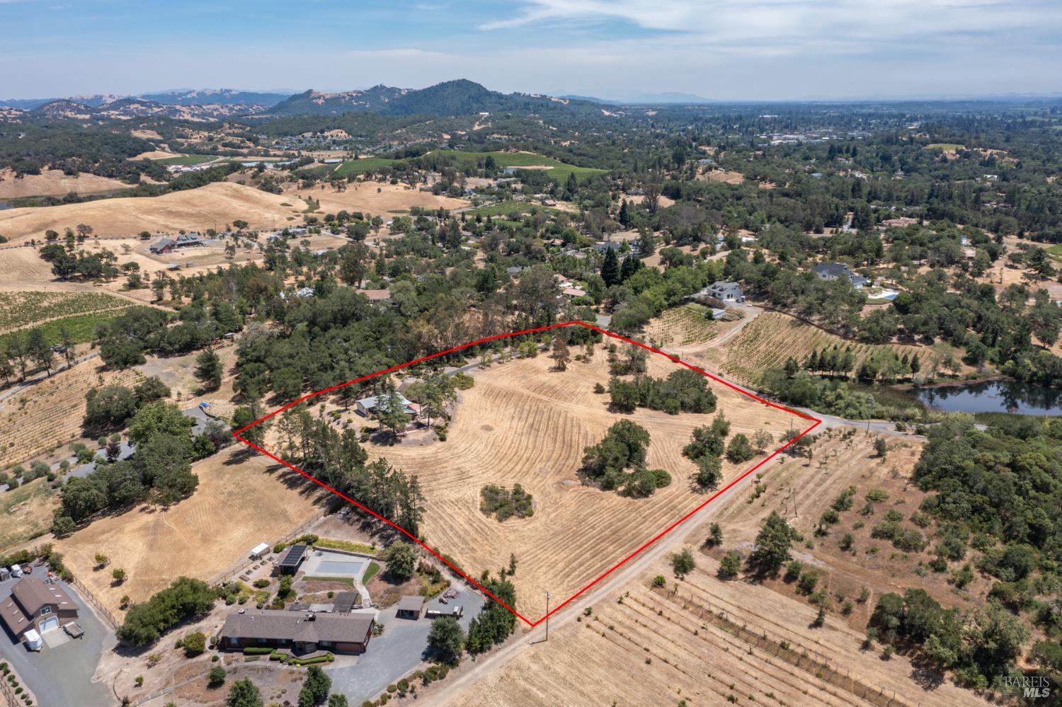 1676 Chiquita Road Healdsburg, CA 95448 - Photo 38 of 45 an aerial view of a house with a mountain