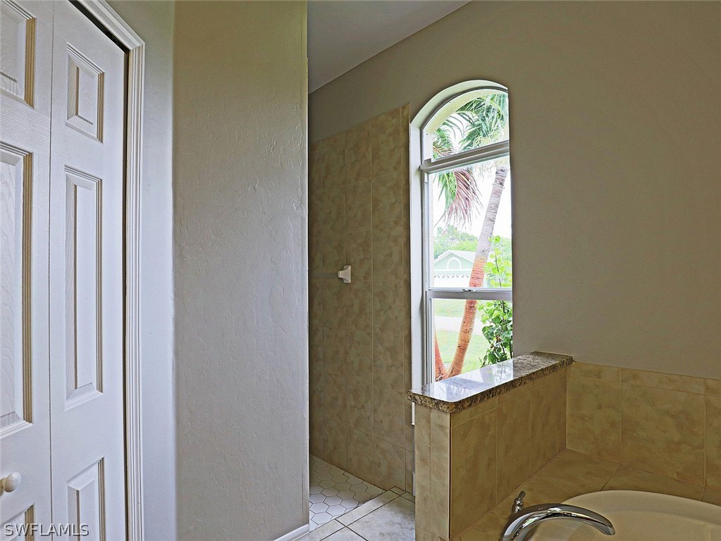 18242 Hemlock Road Fort Myers, FL 33967 - Photo 19 of 29 a view of entryway with a window