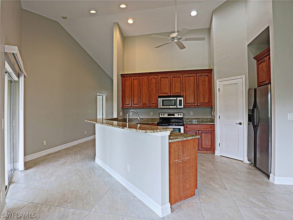 18242 Hemlock Road Fort Myers, FL 33967 - Photo 24 of 29 a view of kitchen with stainless steel appliances cabinets