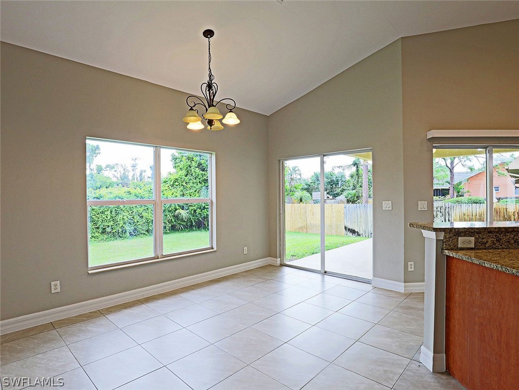 18242 Hemlock Road Fort Myers, FL 33967 - Photo 26 of 29 a view of an empty room with a window