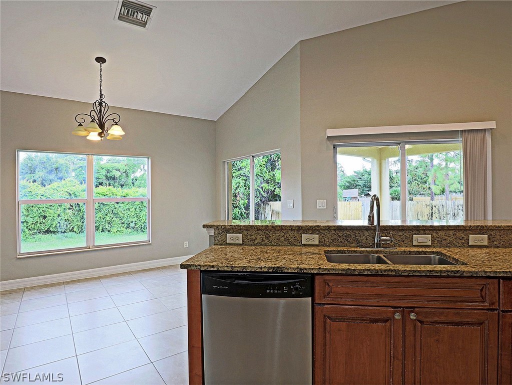 18242 Hemlock Road Fort Myers, FL 33967 - Photo 29 of 29 a kitchen with a sink and large window