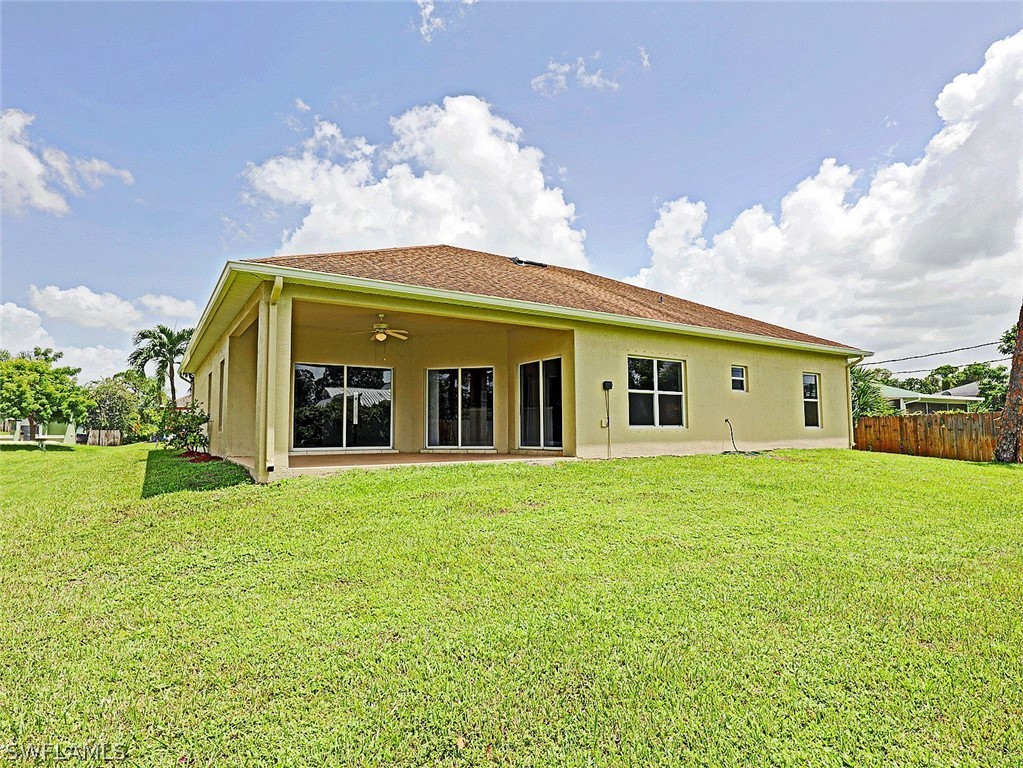 18242 Hemlock Road Fort Myers, FL 33967 - Photo 3 of 29 a front view of house with yard and seating