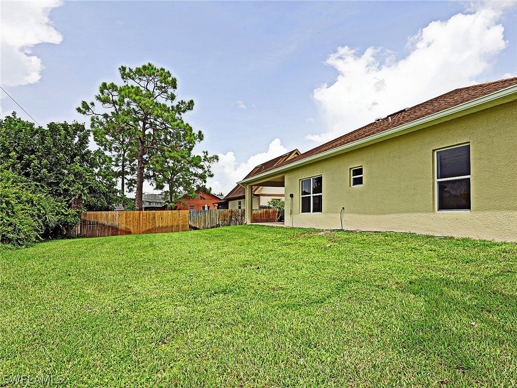 18242 Hemlock Road Fort Myers, FL 33967 - Photo 8 of 29 a house view with garden space