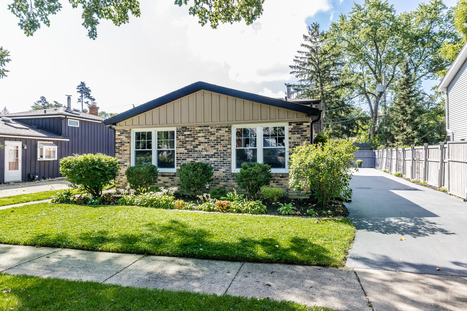 449 Geneva Road Glen Ellyn, IL 60137 - Photo 1 of 21 a front view of a house with a yard
