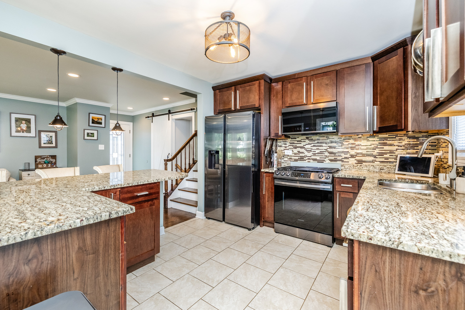 449 Geneva Road Glen Ellyn, IL 60137 - Photo 11 of 21 a kitchen with granite countertop a stove top oven and cabinets