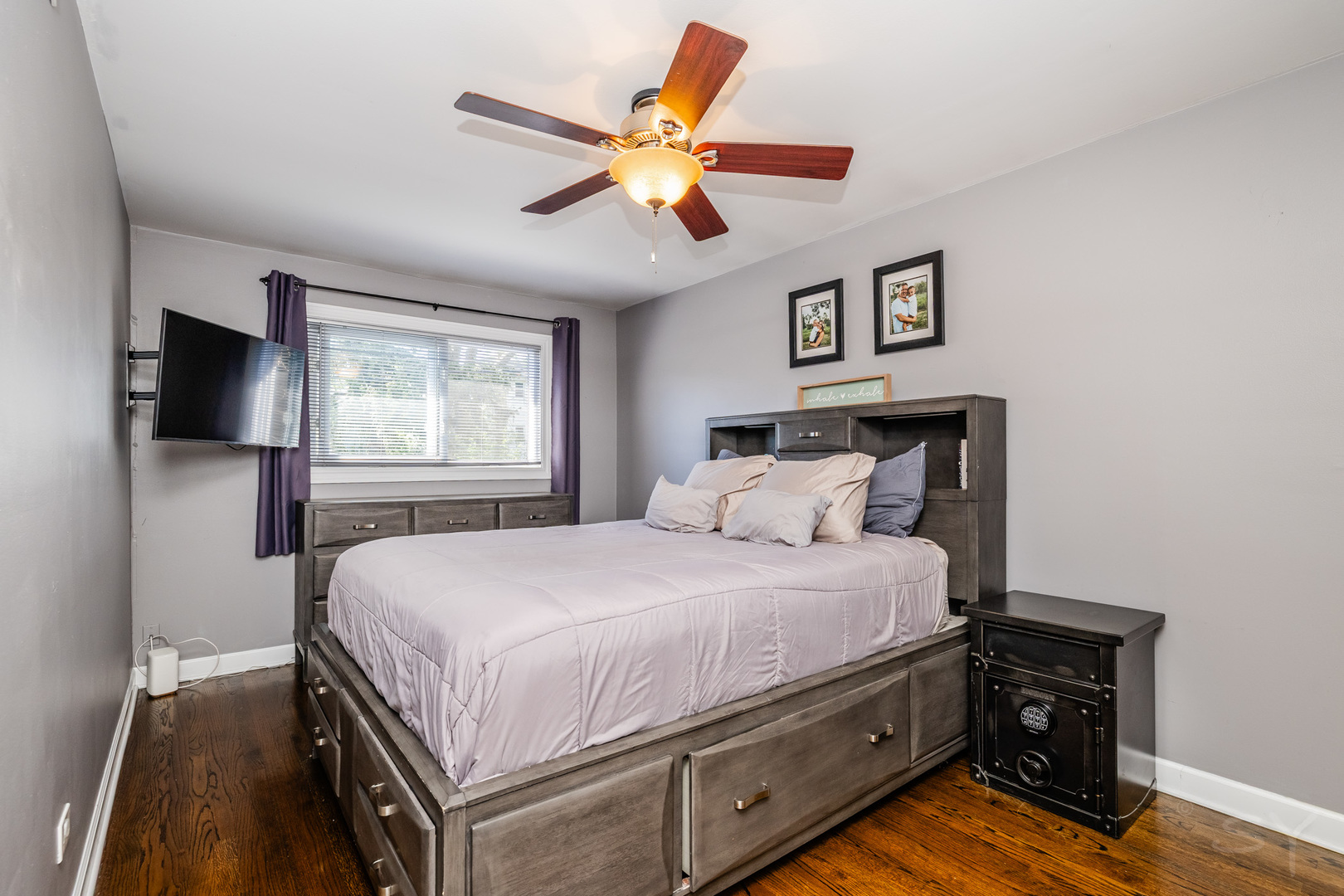 449 Geneva Road Glen Ellyn, IL 60137 - Photo 16 of 21 a bedroom with a bed and a flat screen tv