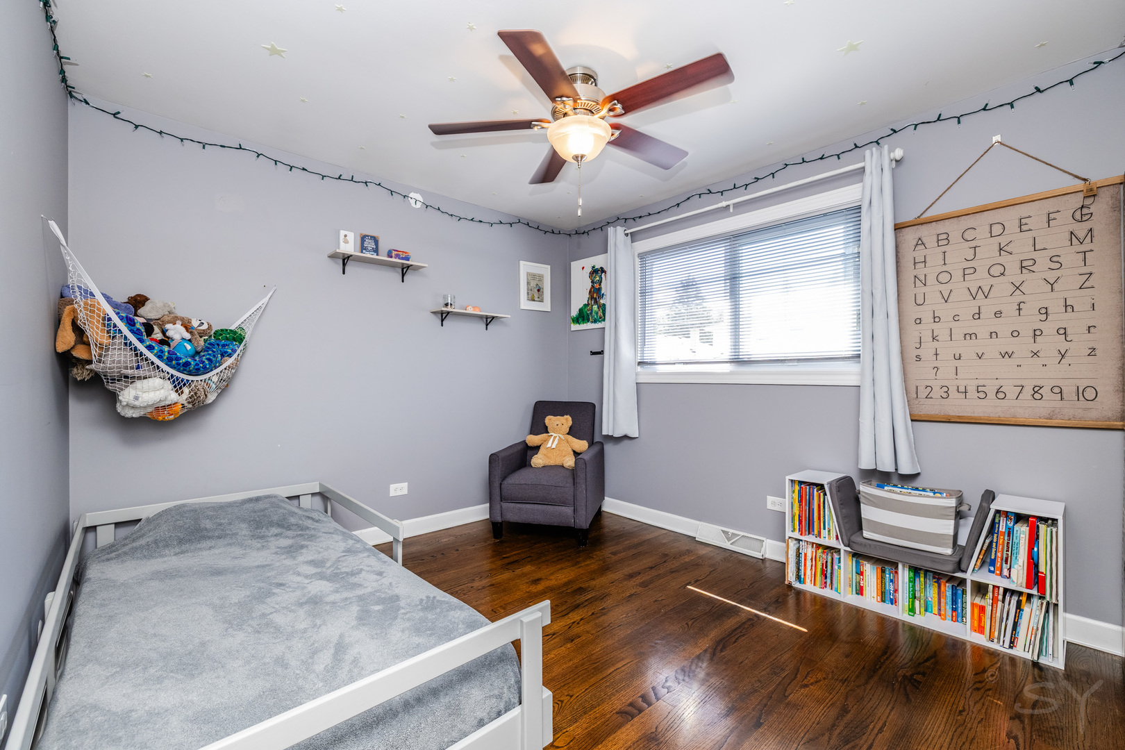 449 Geneva Road Glen Ellyn, IL 60137 - Photo 20 of 21 a living room with furniture and a wooden floor