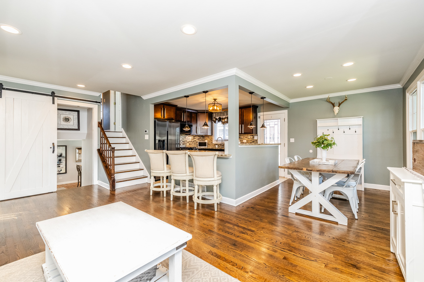 449 Geneva Road Glen Ellyn, IL 60137 - Photo 7 of 21 a view of a dining room with furniture and wooden floor