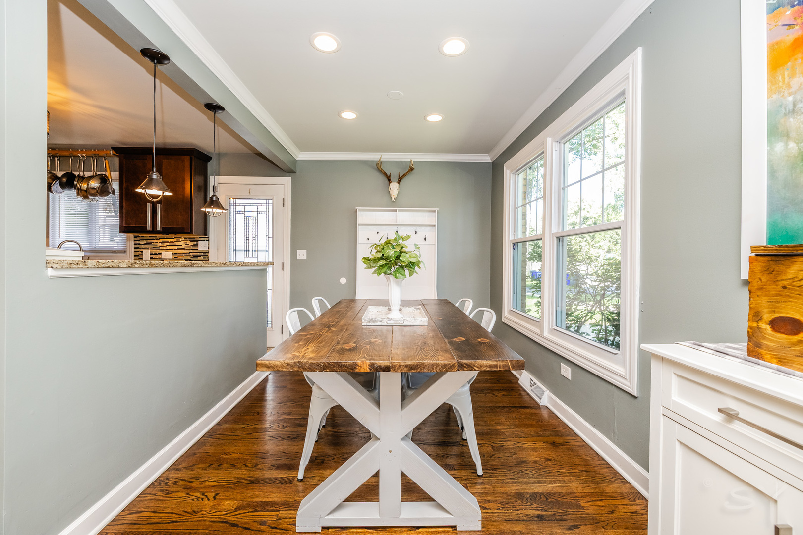 449 Geneva Road Glen Ellyn, IL 60137 - Photo 8 of 21 a dining room with wooden floor and a window