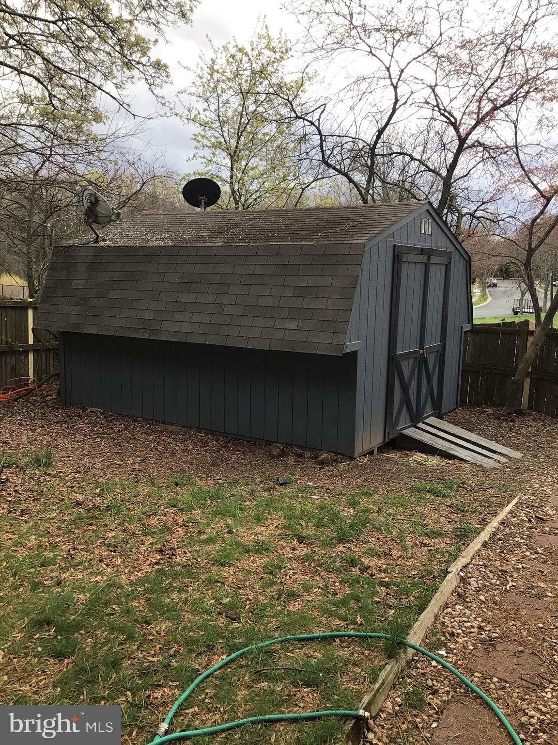 7679 Tuckerman Drive Hanover, MD 21076 - Photo 26 of 30 a view of garage and yard