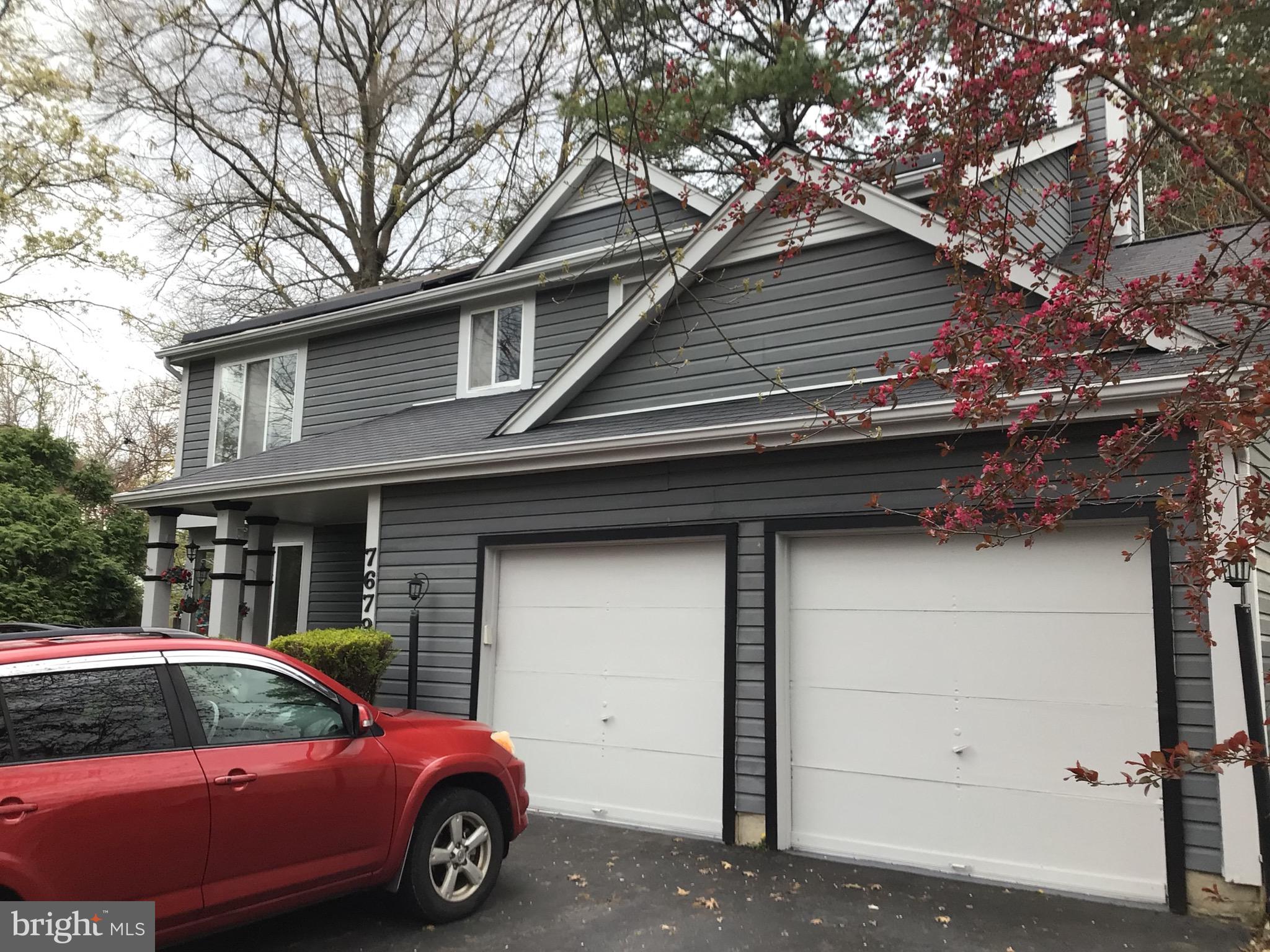 7679 Tuckerman Drive Hanover, MD 21076 - Photo 3 of 30 a car parked in front of a house