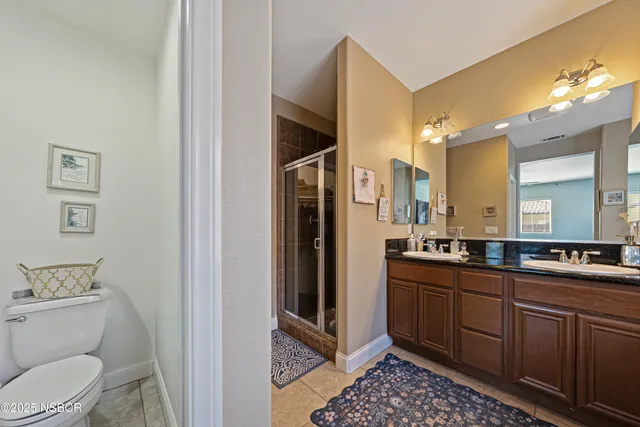 a bed room with a bed and a dresser