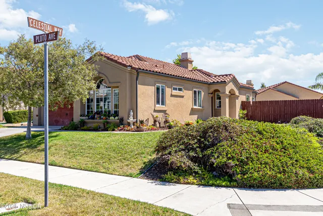 a house view with a outdoor space