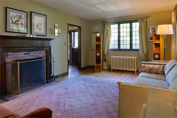 72 Grapevine Road Wenham, MA 01984 - Photo 8 of 22 a living room with furniture and a fireplace