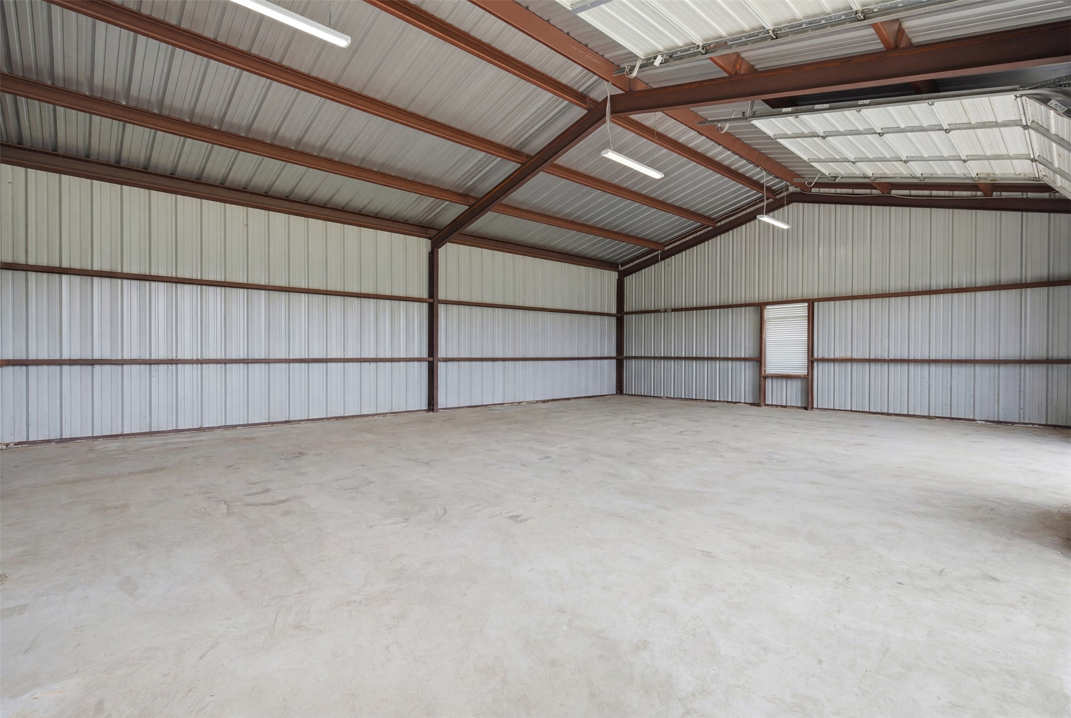 2043 Fm 971 Georgetown, TX 78626 - Photo 6 of 12 A spacious, unobstructed interior provides limitless possibilities for storage or workshop use.