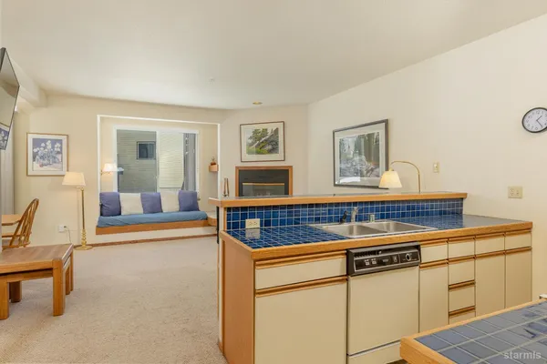 a bedroom with furniture and window