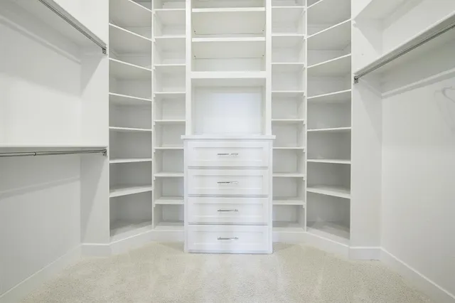 a view of an empty room with empty racks