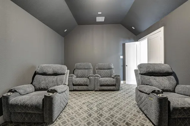 a living room with furniture and a couch