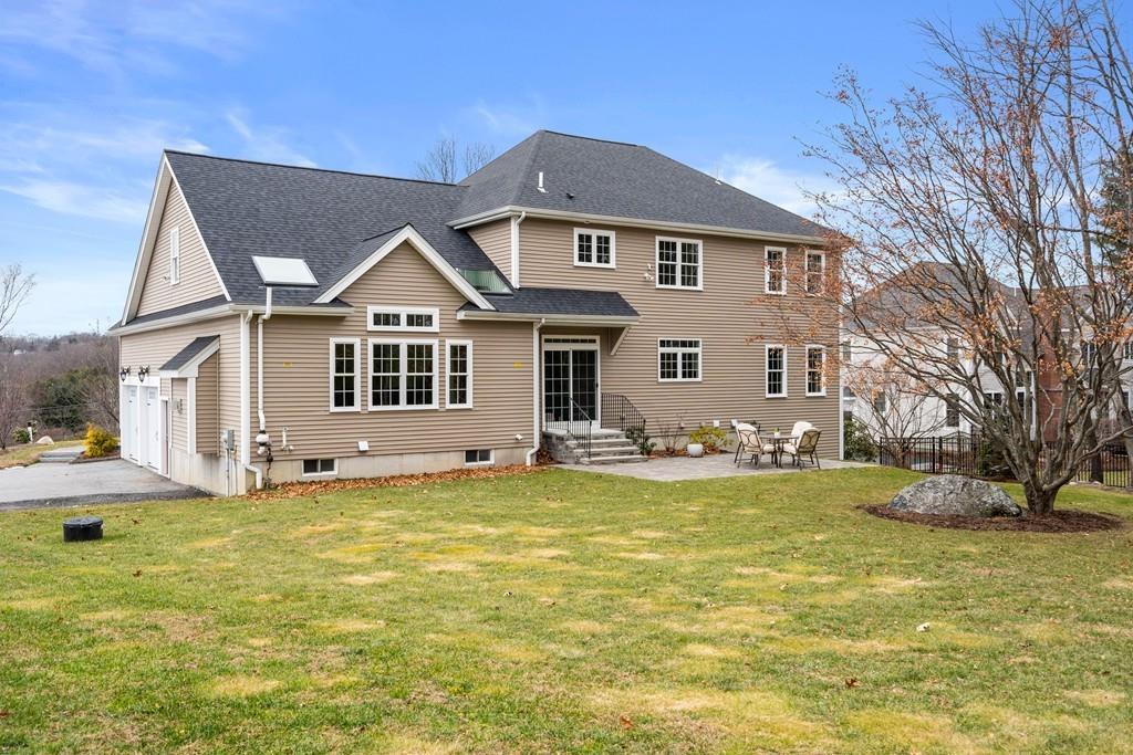 76 Deerfoot Road Southborough, MA 01772 - Photo 23 of 25 a view of a house with a swimming pool