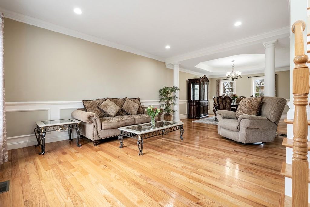 76 Deerfoot Road Southborough, MA 01772 - Photo 7 of 25 a living room with furniture and a table