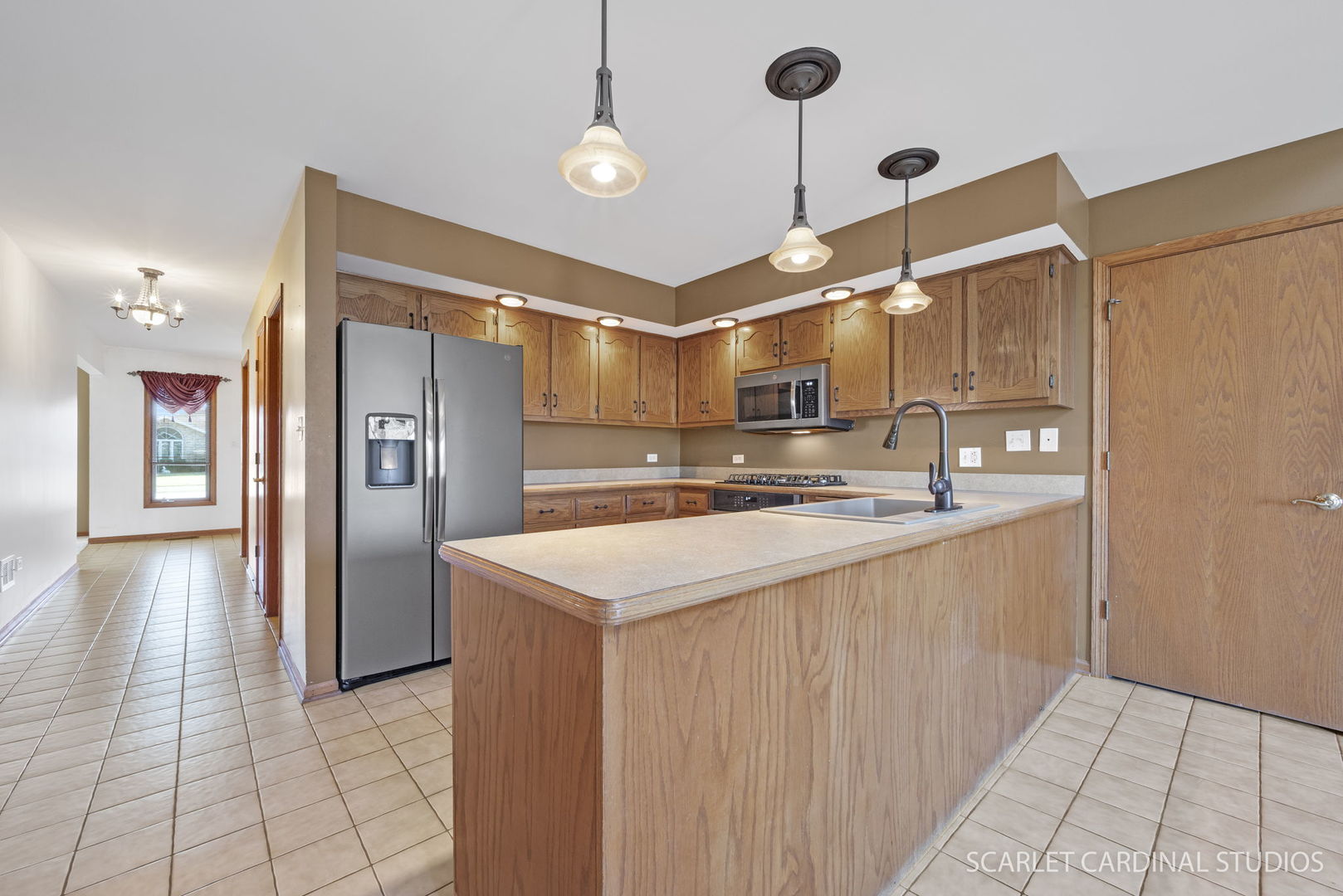 20428 South Grand Prairie Lane Frankfort, IL 60423 - Photo 7 of 29 a kitchen with stainless steel appliances a refrigerator and a sink