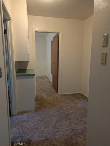 a view of hallway with sink