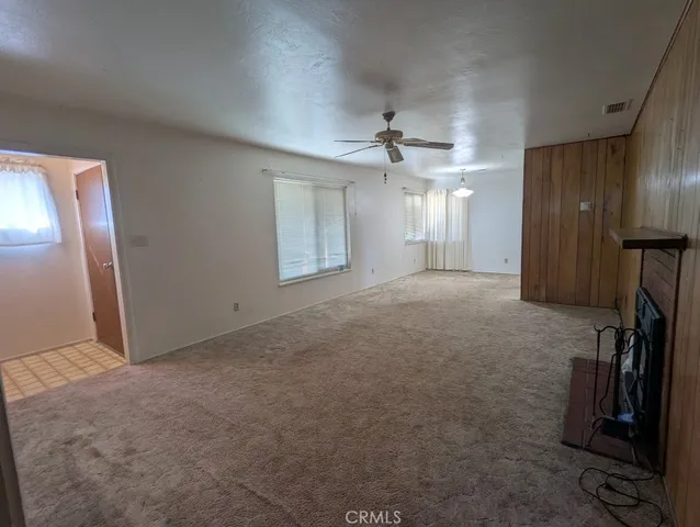 a view of a livingroom with a fireplace
