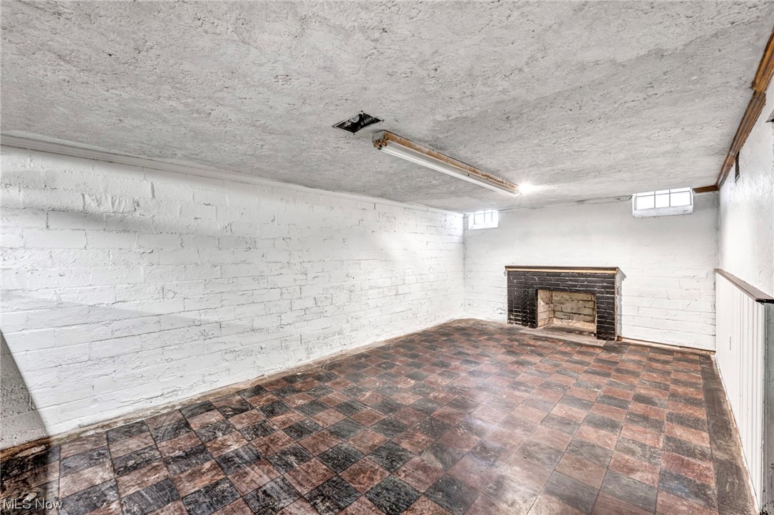 3946 Lansdale Road Cleveland, OH 44118 - Photo 39 of 42 Basement with a fireplace