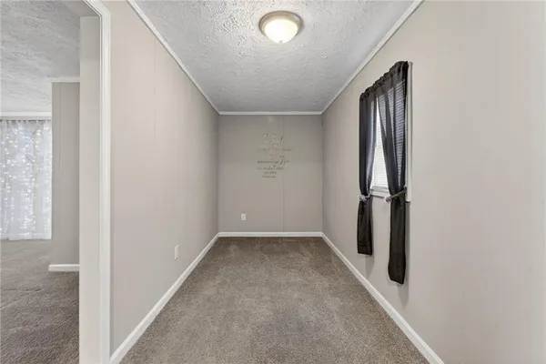 a view of a livingroom with an entryway