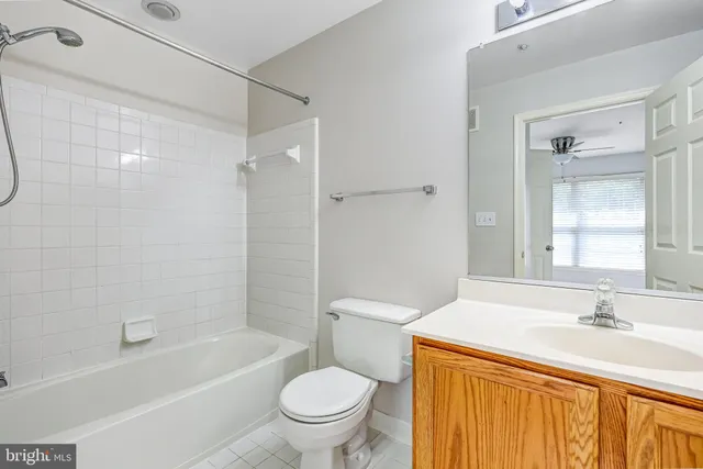 a bathroom with a sink a toilet and a bathtub