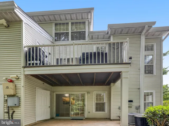 a front view of a house with a porch