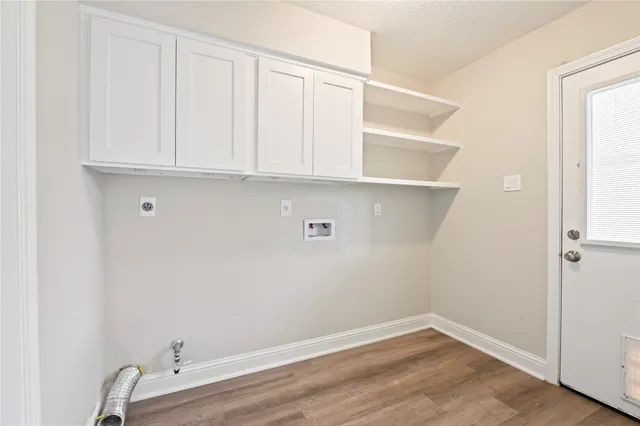 an empty room with cabinet