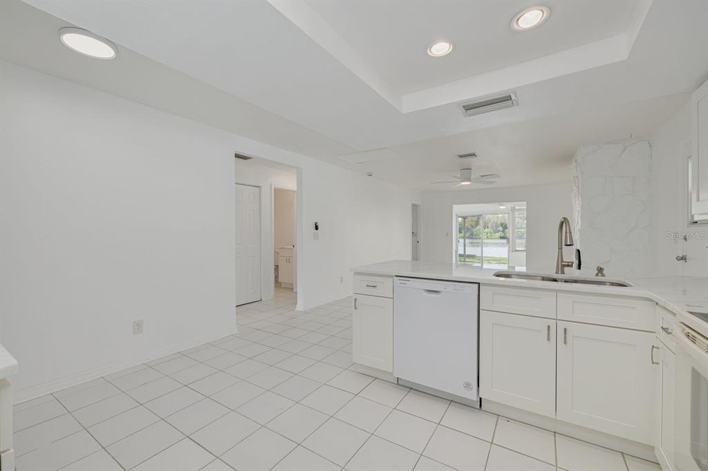 14519 Birch Street Hudson, FL 34667 - Photo 14 of 32 a spacious bathroom with a sink and a mirror