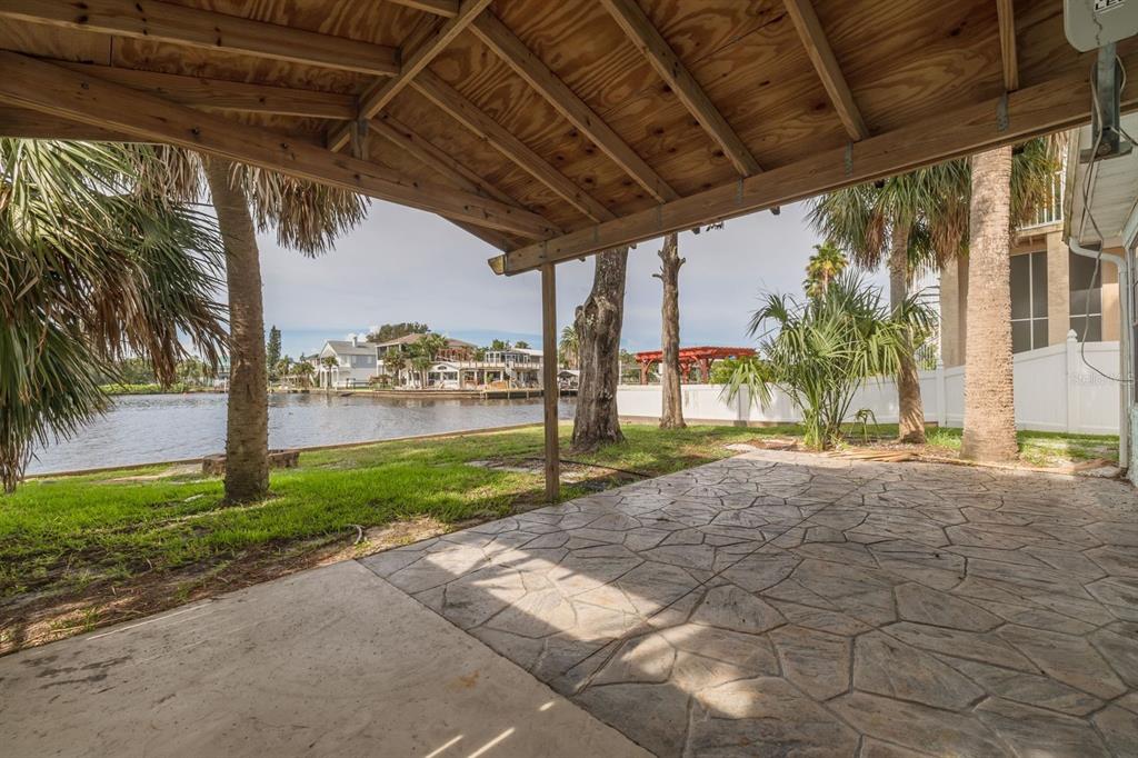 14519 Birch Street Hudson, FL 34667 - Photo 28 of 32 a view of a porch with a garden