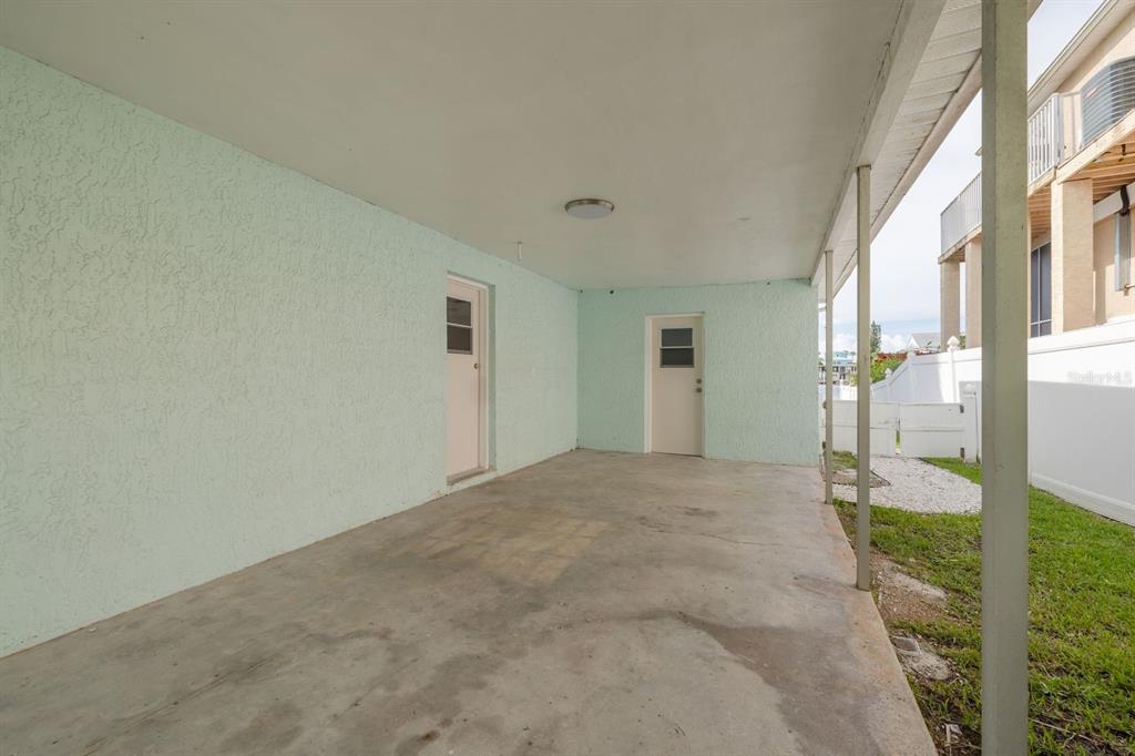 14519 Birch Street Hudson, FL 34667 - Photo 10 of 32 a view of a big room with windows and entryway