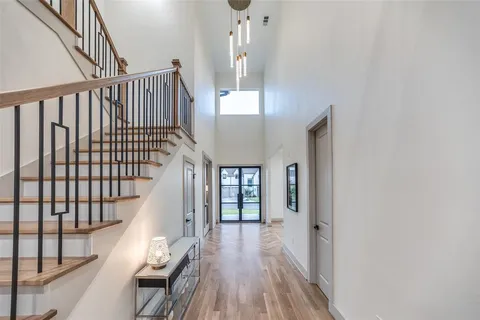 a view of entryway with wooden floor