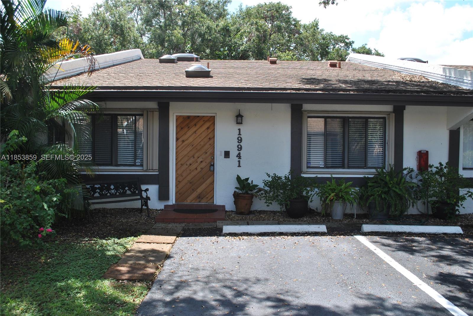 19941 Northeast 5th Court, Unit 3M Miami, FL 33179 - Photo 1 of 25 a front view of a house