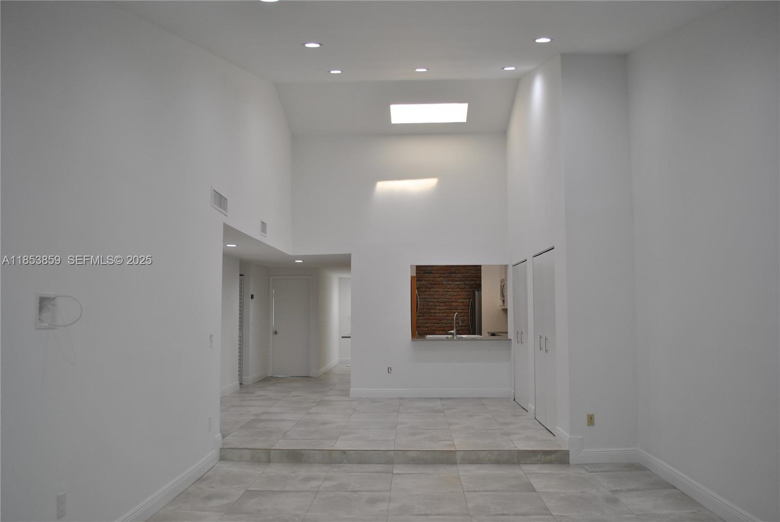 19941 Northeast 5th Court, Unit 3M Miami, FL 33179 - Photo 11 of 25 a view of a hallway
