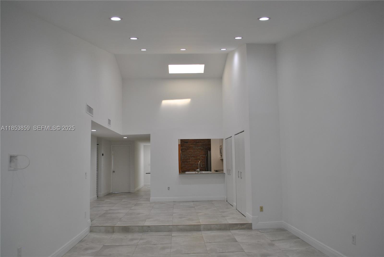 19941 Northeast 5th Court, Unit 3M Miami, FL 33179 - Photo 13 of 25 a view of a hallway